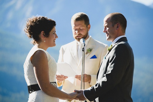bride and groom lakeside ceremony by kootenay wedding photographer electrify photography