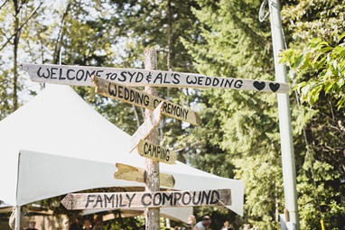 rustic event sign post by kootenay wedding photographer electrify photography