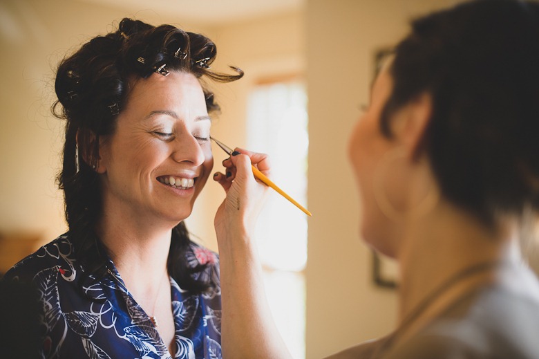 bride's makeup application at vintage okanagan wedding by nelson, kelowna, bc, wedding photographer electrify photography