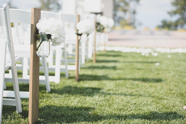 white flower decor at vintage okanagan wedding by nelson, kelowna, bc, wedding photographer electrify photography