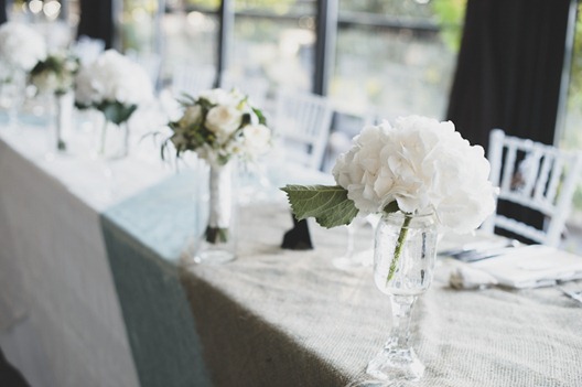 white flower decor at vintage okanagan wedding by nelson, kelowna, bc, wedding photographer electrify photography