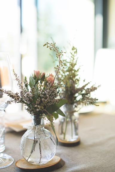 kelowna wedding, reception decor, flowers in jar with lace and wood 