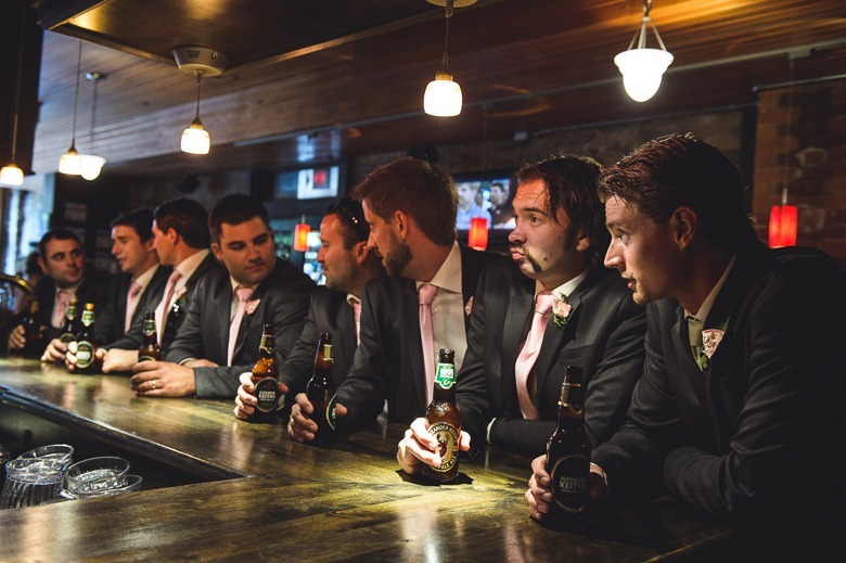 guys at the bar by electrify photography nelson bc and kootenay wedding photographer