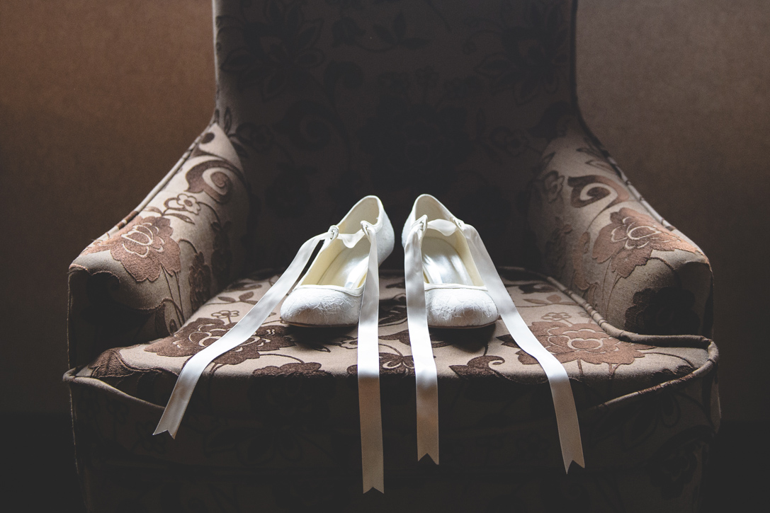 Beautiful white ribbon shoes, 1920s, by Nelson BC Kootenay wedding photographer Emilee Zaitsoff of Electrify Photograph