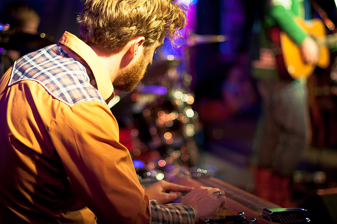 Grant Siemens of Corb Lund and the Hurtin' Albertans gives country some slide at Spiritbar in Nelson, BC, photo by Electrify Photography